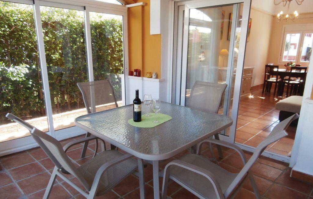 Ona Mar Menor Golf & Spa Torre-Pacheco Room photo A patio table and chairs
